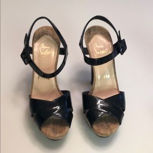Christian Louboutin black patent leather heals